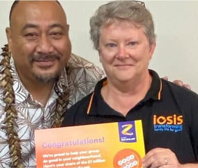 Larry Tupa'i-Lavea of Aiga Energy Ltd presents the 'cheque' to Iosis